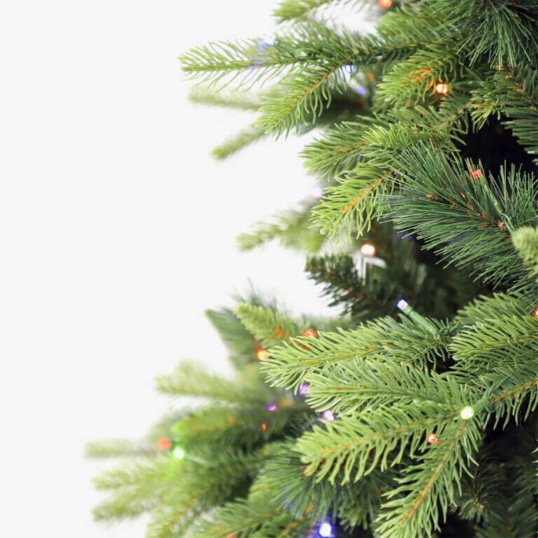 artificial christmas tree, with lights, showing high PVC tip count.